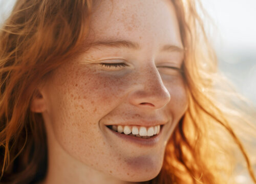 Happy, healthy red headed woman