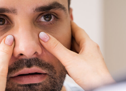 Photo of a man receiving medical care for sinusitis